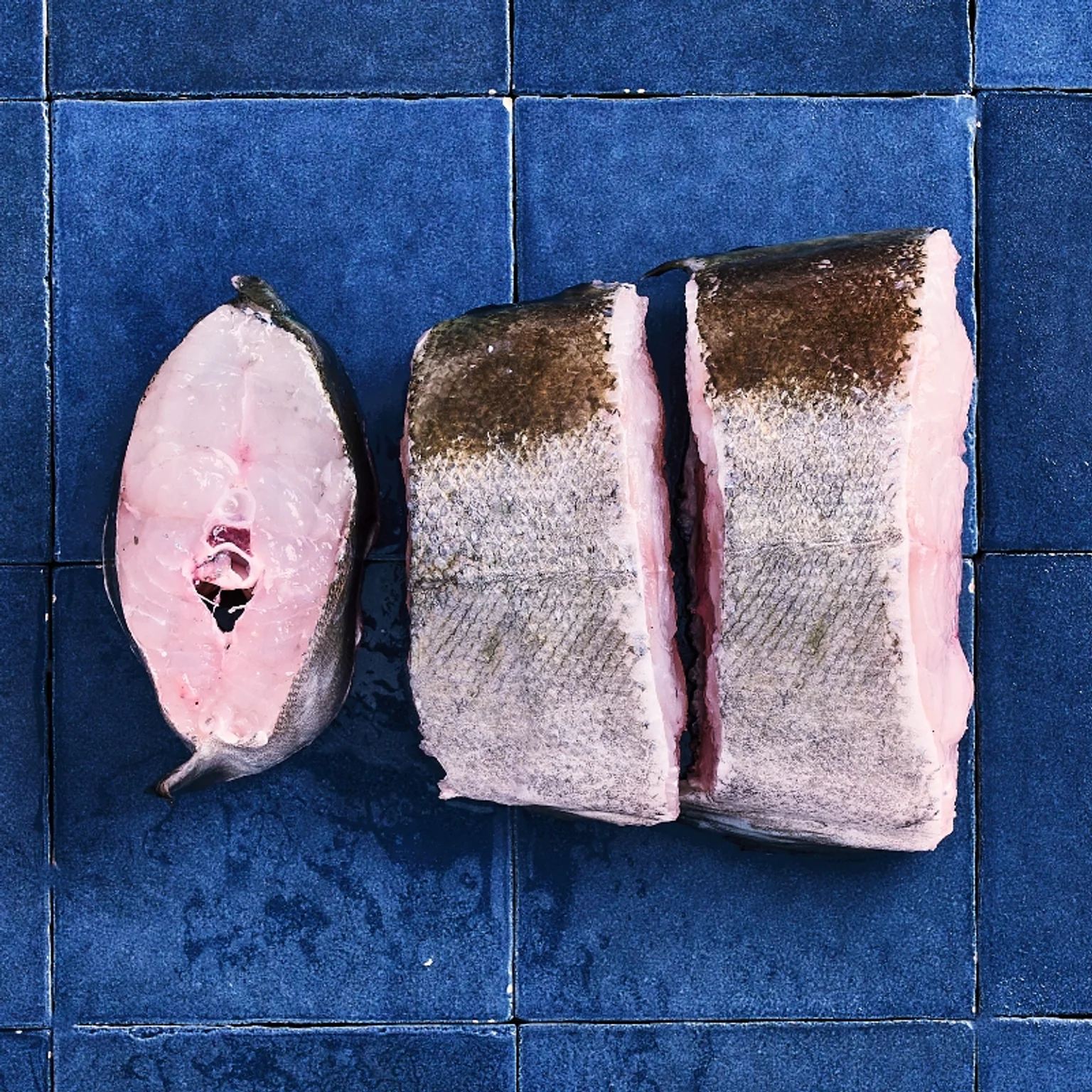 trois darnes de lieu jaune prêtes à cuire 